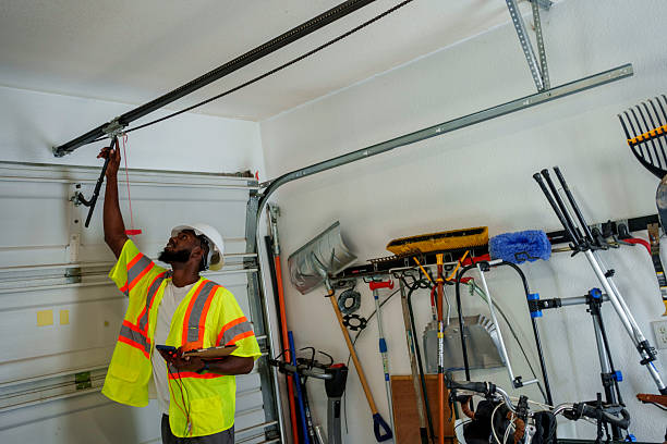 Professional Garage Door Roller Replacement technician working in Perry, KS